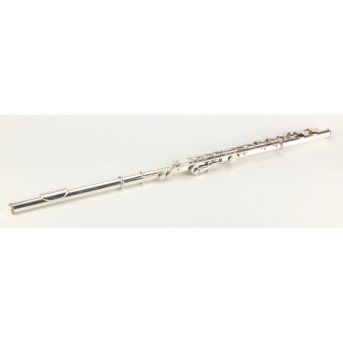 148 - Rudall Carte & Co sonata NS silver coloured metal flute, with fitted case, the flute stamped 8505C J... 