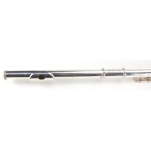 148 - Rudall Carte & Co sonata NS silver coloured metal flute, with fitted case, the flute stamped 8505C J... 