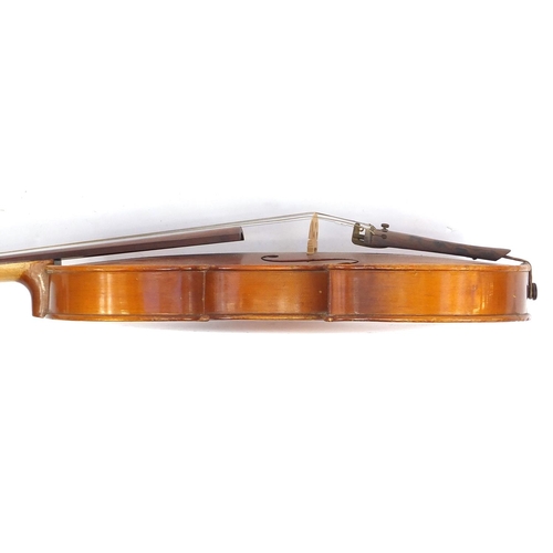 138 - Old wooden violin with scrolled neck, the back 14.5