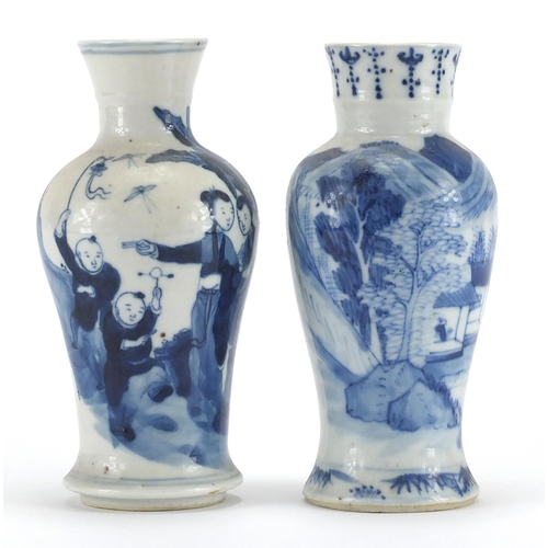 374 - Two Chinese blue and white porcelain baluster vases with flared rims, one hand painted with landscap... 