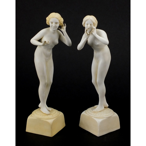 586 - Pair of Art Deco porcelain figurines, both of nude females, 
numbered to the bases, each 20.5cm high