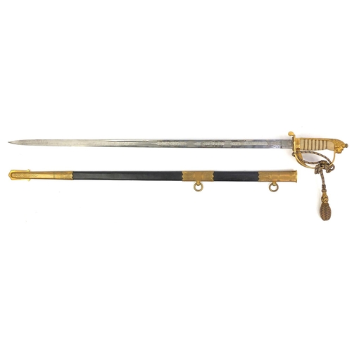 289 - British Military World War II Naval dress sword by Moss Bro's of Cambridge Circus, with belt and han... 