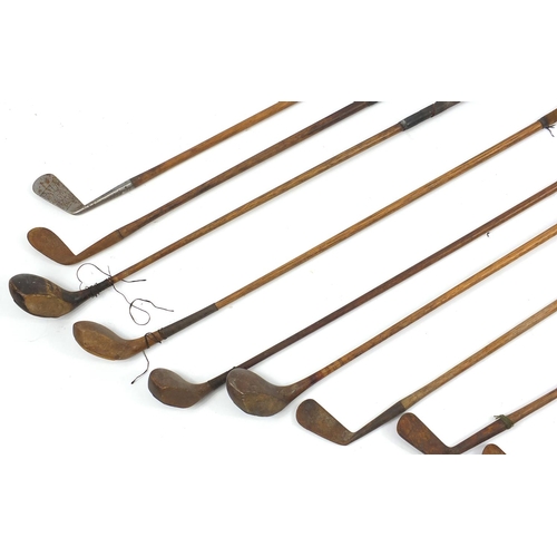 170 - Eleven vintage wooden shafted golf clubs