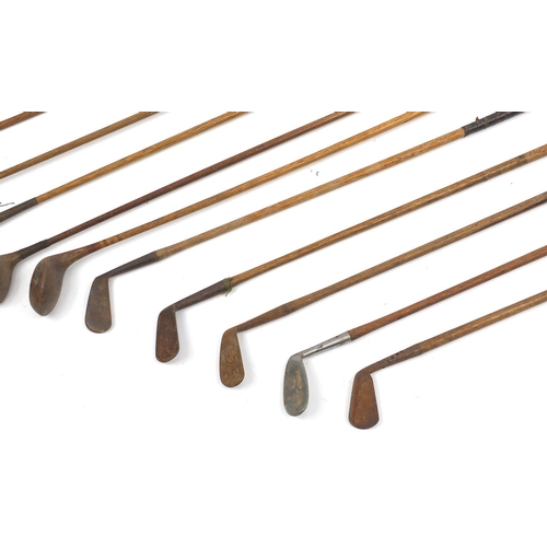 170 - Eleven vintage wooden shafted golf clubs