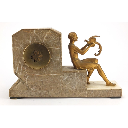 600 - Art Deco marble and onyx mantel clock, signed J Dauvergne, mounted with a female holding a bird, the... 