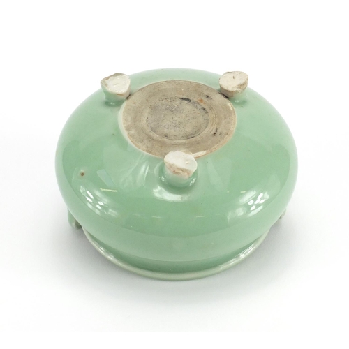 381 - Chinese celadon glazed tripod incense burner with twin handles, 8.5cm high x 12cm in diameter