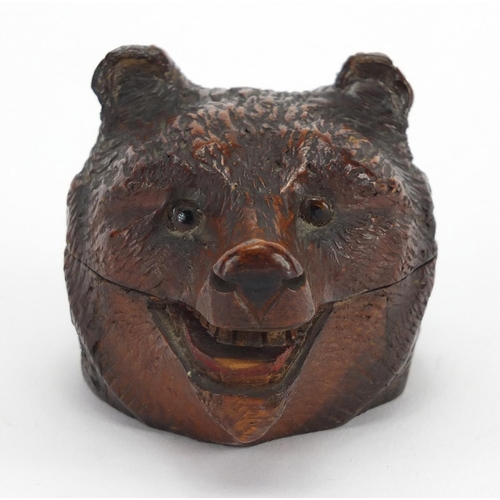 13 - Swiss Black forest carved wooden bears head stamp box, with beaded eyes, 9cm in length