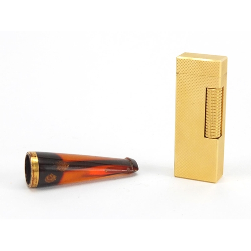 81 - Gold plated Dunhill pocket lighter and cheroot with gold coloured metal mount, both with fitted case... 