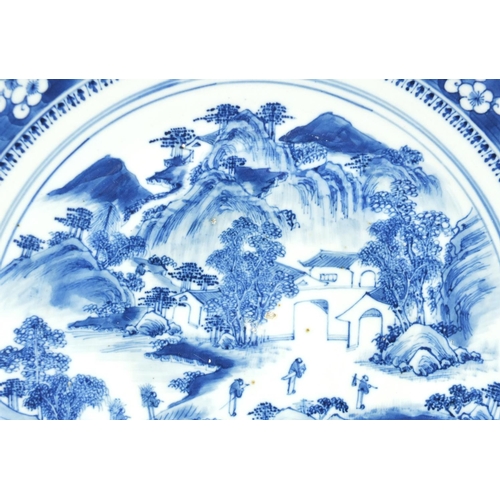 373 - Chinese blue and white porcelain charger, hand painted with figures in a river landscape, 41cm in di... 