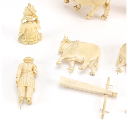 485 - 19th century Indian carved ivory including figures in a carriage and animals, the largest piece 11cm... 