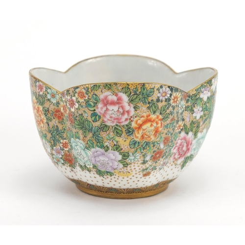 390 - Japanese porcelain cup and saucer, finely hand painted with flowers and butterflies, six figure char... 