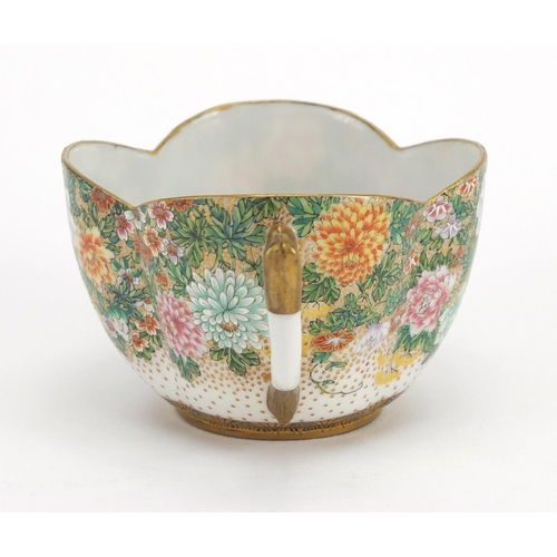 390 - Japanese porcelain cup and saucer, finely hand painted with flowers and butterflies, six figure char... 