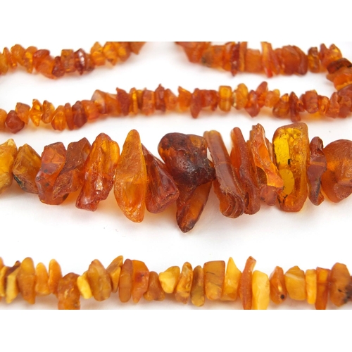 792 - Vintage necklaces including amber, jet and polished stones