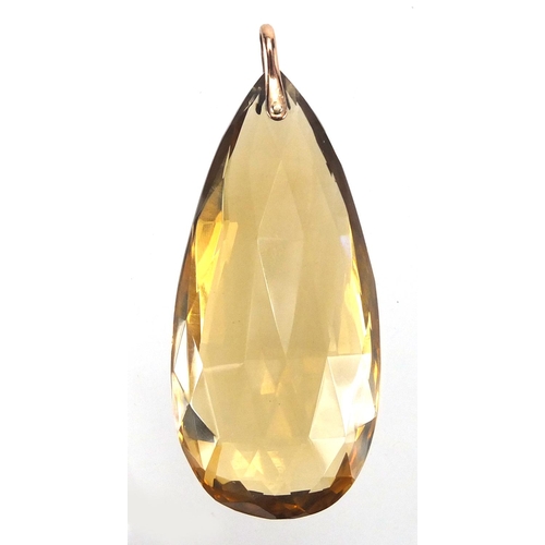 725 - Large smoky Quartz tear drop pendant, with unmarked gold suspension loop, 6.5cm in length, approxima... 