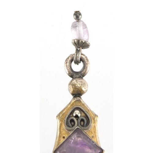 773 - Designer brooch set with amethyst stones, 5cm in length, approximate weight 16.5g