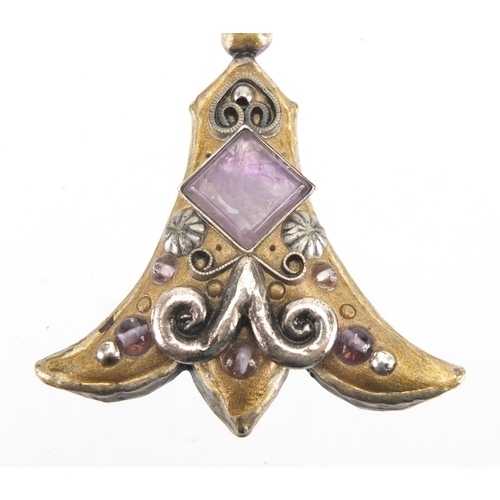 773 - Designer brooch set with amethyst stones, 5cm in length, approximate weight 16.5g