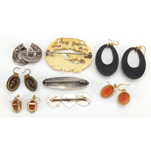 770 - Antique and later earrings and brooches including Victorian silver brooches, 9ct gold cameo earrings... 