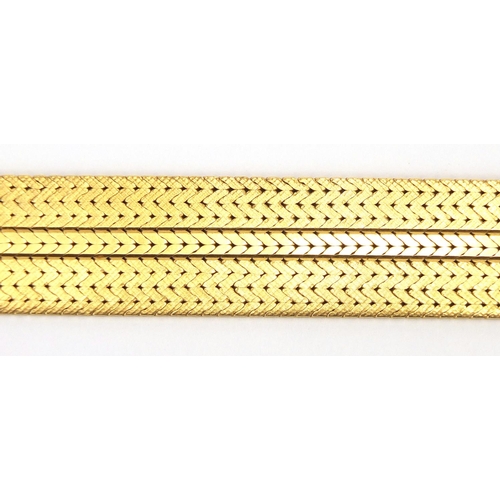 678 - Heavy 18ct gold wide herringbone link bracelet, 19cm in length x 2.2cm wide, approximate weight 104.... 