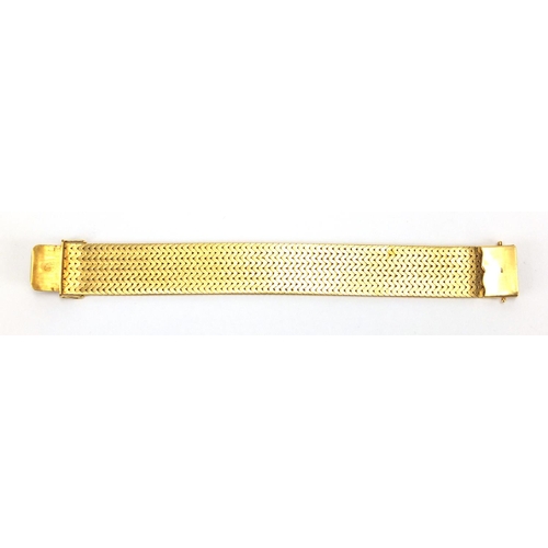 678 - Heavy 18ct gold wide herringbone link bracelet, 19cm in length x 2.2cm wide, approximate weight 104.... 