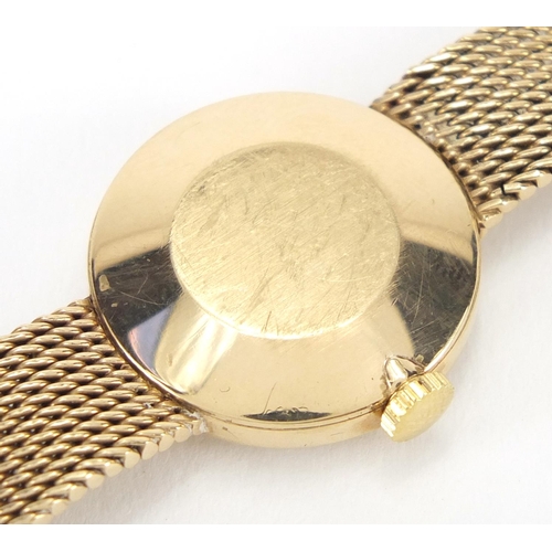 824 - Ladies 9ct gold Omega wristwatch with 9ct gold strap, 2.1cm in diameter, approximate weight 24.4g