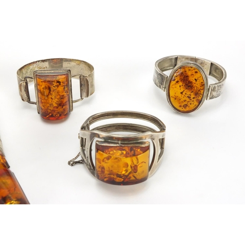 794 - Silver and natural amber necklace and three bracelets, the necklace 32cm in length, approximate weig... 