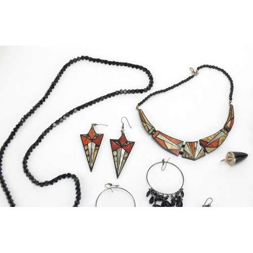 774 - Vintage jewellery including jet necklaces and earrings