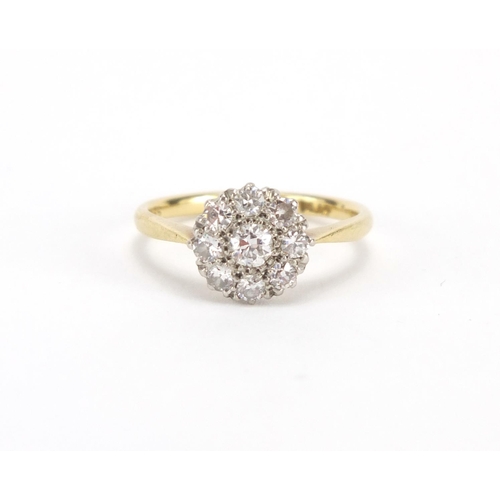 697 - 18ct gold diamond nine cluster ring, size M, approximate weight 3.0g