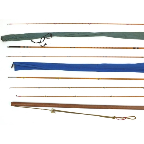 158 - Seven split cane fishing rods including two Hardy Bros Fibalite Spinning, each with canvas bags