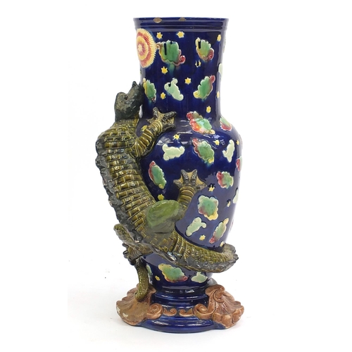 575 - Large George Jones Majolica vase, decorated in relief with a dragon, hand painted with clouds, numbe... 