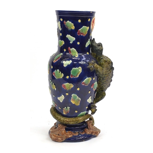 575 - Large George Jones Majolica vase, decorated in relief with a dragon, hand painted with clouds, numbe... 