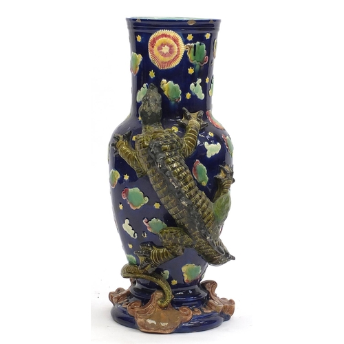 575 - Large George Jones Majolica vase, decorated in relief with a dragon, hand painted with clouds, numbe... 