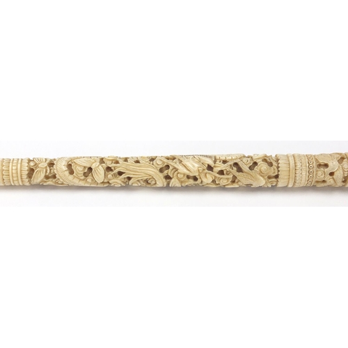 442 - Two Chinese Canton ivory parasol handles, both carved with dragons and phoenix's, the largest 37.5cm... 