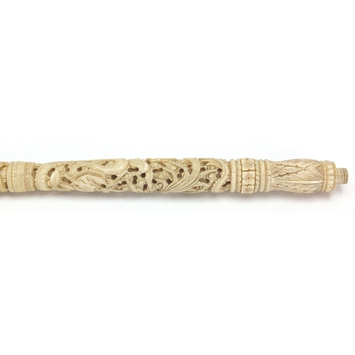 442 - Two Chinese Canton ivory parasol handles, both carved with dragons and phoenix's, the largest 37.5cm... 