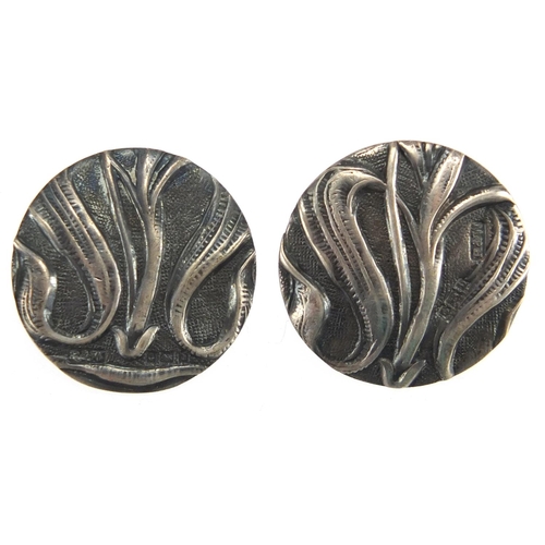 618 - Set of four Art Nouveau silver buttons, each 2.3cm in diameter, approximate weight 15.8g