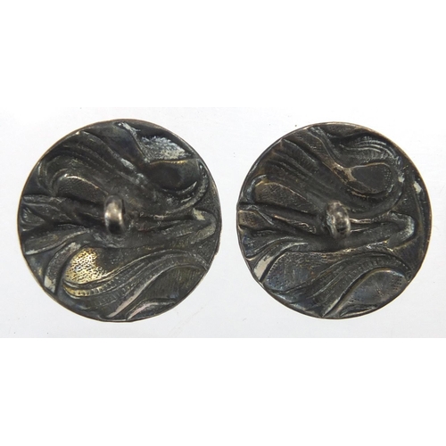 618 - Set of four Art Nouveau silver buttons, each 2.3cm in diameter, approximate weight 15.8g