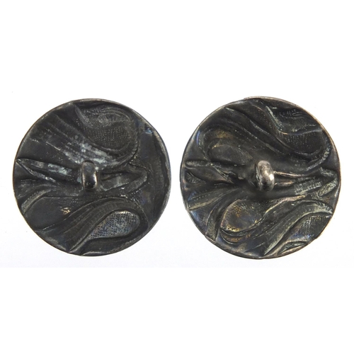 618 - Set of four Art Nouveau silver buttons, each 2.3cm in diameter, approximate weight 15.8g