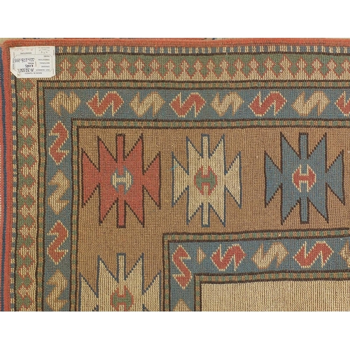 2047 - Rectangular Turkish rug having an all over geometric design with corresponding boarders, approximate... 