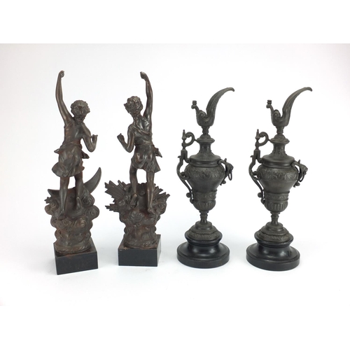 182 - Pair of classical bronzed ewers and figures, the largest 42cm high