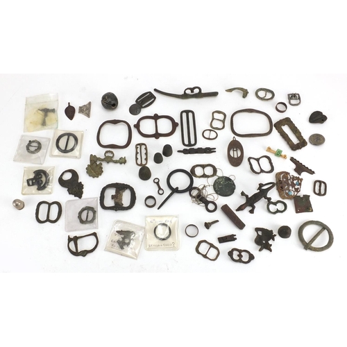 629 - Large selection of metal detecting finds including belt buckles