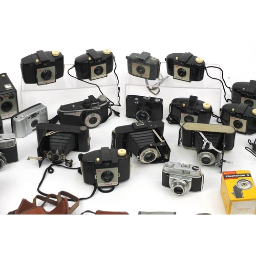 315 - Vintage cameras with cases and accessories including Praktica and Minolta examples