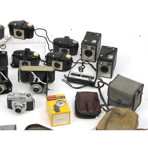 315 - Vintage cameras with cases and accessories including Praktica and Minolta examples