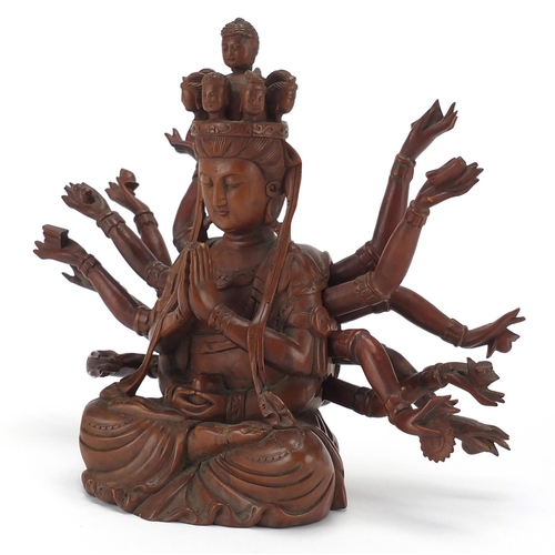 398 - Chinese hardwood carved figure of seated Buddha with detachable arms, 23.5cm high