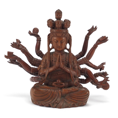 398 - Chinese hardwood carved figure of seated Buddha with detachable arms, 23.5cm high