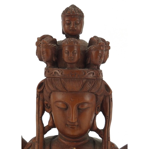 398 - Chinese hardwood carved figure of seated Buddha with detachable arms, 23.5cm high