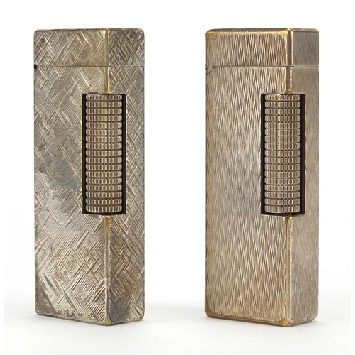 83 - Two Dunhill silver plated pocket lighters, one with fitted case, each 6.5cm high