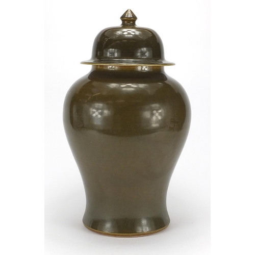 382 - Large Chinese dark green glazed jar and cover, impressed character marks around the shoulder, overal... 