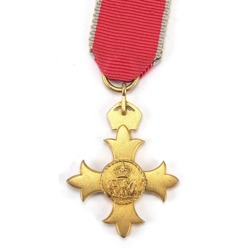 272 - Silver gilt OBE with dress medal, housed in a fitted tooled leather case