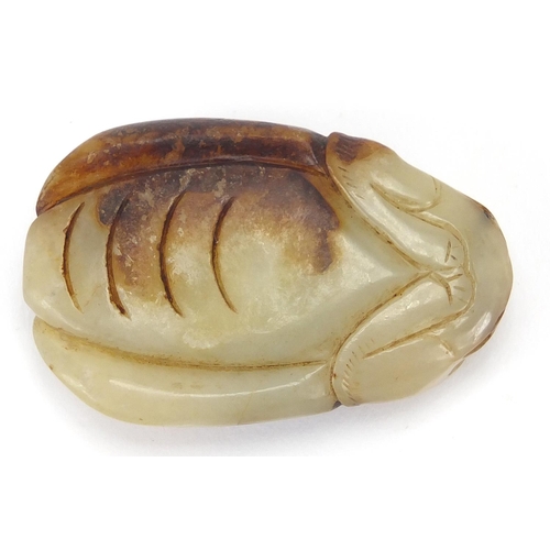 427 - Chinese pale green and russet jade carving of a beetle, 5.5cm in length