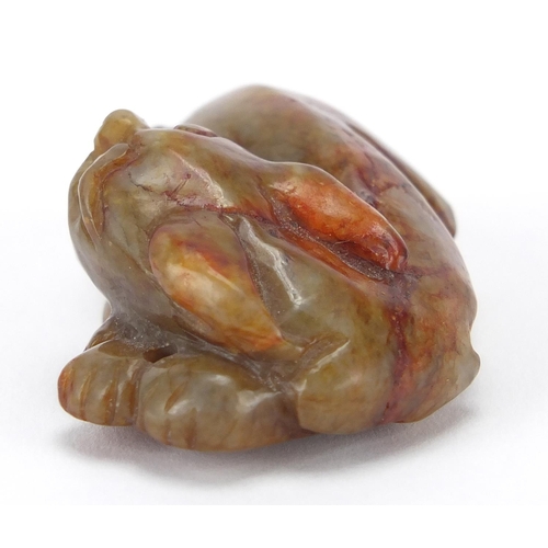 425 - Chinese russet jade carving of a mythical lion, 6cm wide