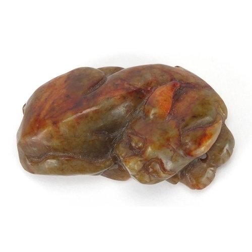 425 - Chinese russet jade carving of a mythical lion, 6cm wide